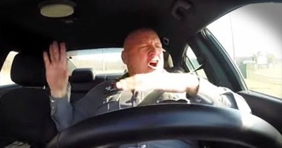 Dash Cam Records Police Officer Hilariously Singing In Car 