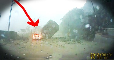 A Giant Boulder Nearly Crushes Car In Mudslide