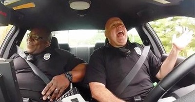 Police Officers’ Hilarious Duet Is Caught On Dash Cam 