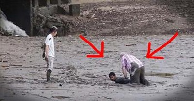 Hero Risks Life To Help Couple Stuck In The Mud 