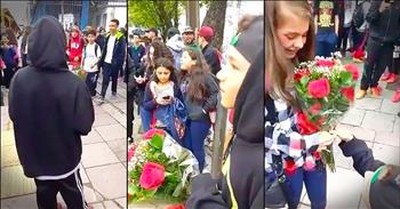 Little Boy Patiently Waits For Crush With Flowers 