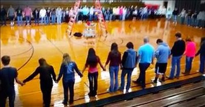 Entire School Prays Together In Gymnasium 
