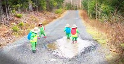 Tiny Kids Playing In A Big Puddle Will Make Your Day 