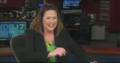 News Anchor Can't Stop Laughing At Swimming Cat On Live TV 