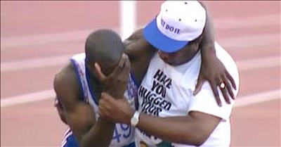Dad Helps Olympic Runner Cross Finish Line After Fall 