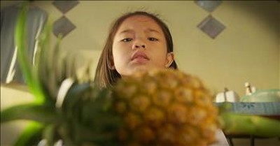 Mother Teaches Her Daughter Life Lessons Using A Pineapple 