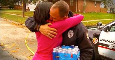 Woman And Police Officer Embrace After Shootings 