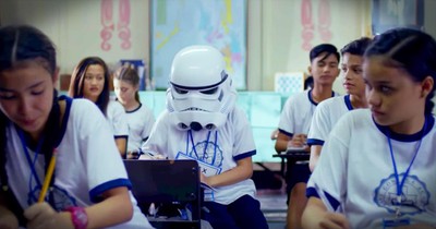 Student Wearing Helmet Gets Surprise From Classmates