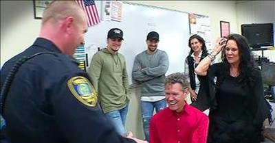 Randy Travis Gives Police Officer Guitar After House Fire 