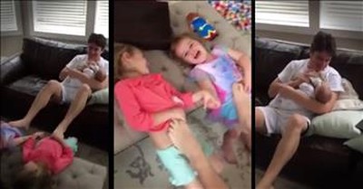 Multi-Tasking Dad Feeds Baby And Plays With 2 Other Kids 