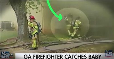 Firefighter Catches A Baby Thrown From A Burning Building 