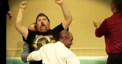 Excited Man Jumps Out Of Water After Baptism 
