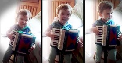 Tiny Tot Thinks He Is An Accordion Master 