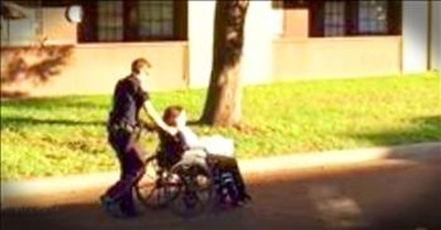 Police Officer Pushes Woman Home In Wheelchair  