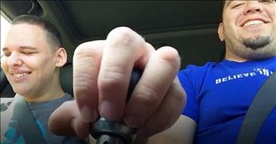 Father And Son Who Is Blind And Has Autism Bond In Car 