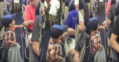 2-Year-Old Greets Plane Passengers With Fist Bump