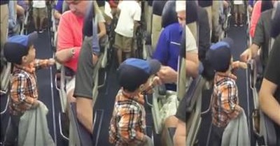 2-Year-Old Greets Plane Passengers With Fist Bump 
