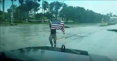 First Responder Saves Flag During Hurricane 