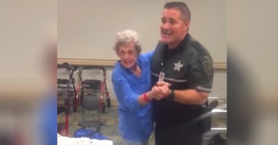 Deputy Dances With Elderly Woman During Storm