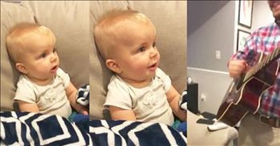 Son Smiles When Dad Plays The Guitar 