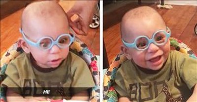 Boy Smiles After Seeing Parents For First Time 