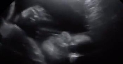 Unborn Baby Waves During Ultrasound 