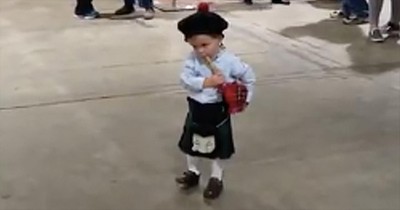 Toddler Plays Along With Bagpipes