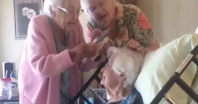 2 Women Brush Sister's Hair In Hospice