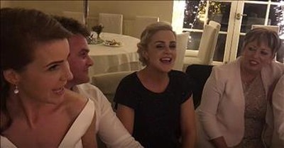 Newlyweds And Friends Perform Irish Song  