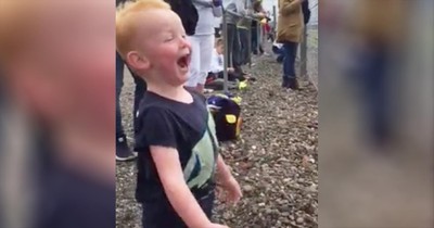 Excited Toddler Loves Motorcycle Race