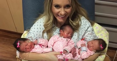 Mother Holds Her Triplets For The First Time