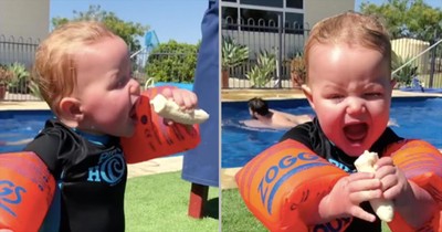Baby Tries To Eat A Banana While Wearing Pool Floaties