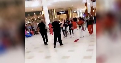 Police Officers Start To Break Up Christmas Flash Mob But Then Join In