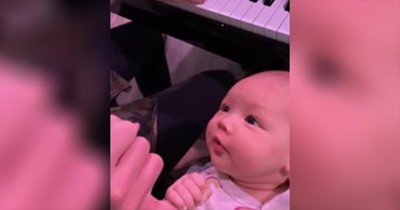 Couple Sings 'I Want To Hold Your Hand' To Infant Baby