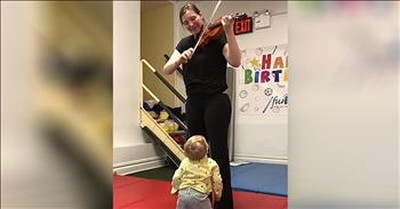 Baby Has Sweet Reaction To Hearing A Violin For First Time 