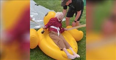 Residents At Nursing Home Have Fun On A Slip N Slide 