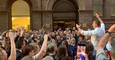 Choir Performs Gospel Song On The Street During NYC Power Outage