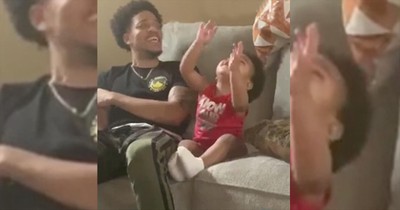 Adorable 2-Year-Old And Dad Worship Together On Couch