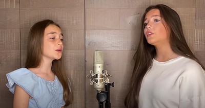 2 Sisters Sing Moving Duet 'In The Arms Of An Angel'