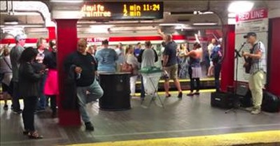 Street Performer Plays 'Sweet Caroline' And Subway Passengers Join In 