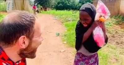 Man Gives Orphan A Doll And She Cannot Contain Her Excitement 
