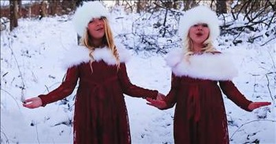 Adorable Sisters Sing 'Go Tell It On The Mountain' 