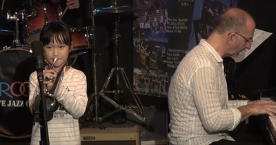 Young Trumpet Player Joins Jazz Band On Stage And Blows The Crowd Away