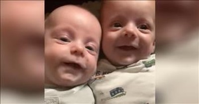 Mother Sings Hymn To Smiling Infant Twins 