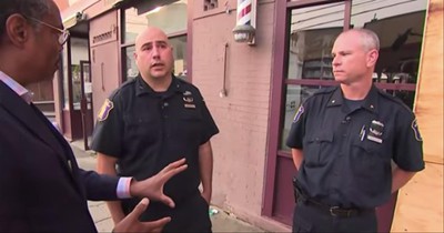 2 Cops Save The Day When Out Of Control Car Pins Mom And Baby