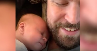 Baby Scratches Head On Daddy's Beard