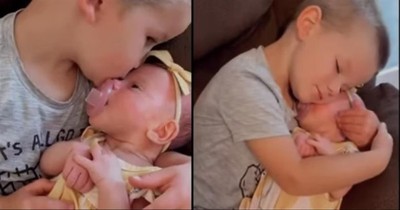 Big Brother Holds Baby Sister And It's A Moment Of Pure Happiness