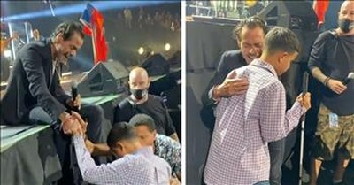 Marc Anthony Jumps Off Stage To Sing With Blind Teen During Concert 