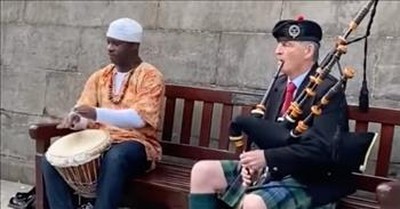 Street Performers Combine Scottish Bagpipes And African Drums 
