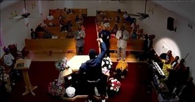Pastor Rushes To Tackle Man With Gun During Sermon 
